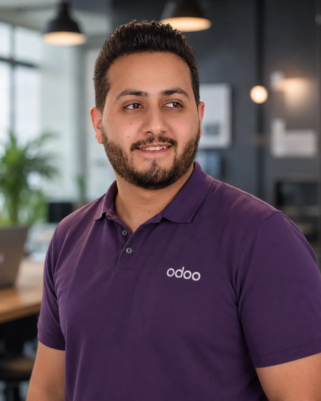 Mina Adel, software engineer and Odoo developer, in an Odoo shirt